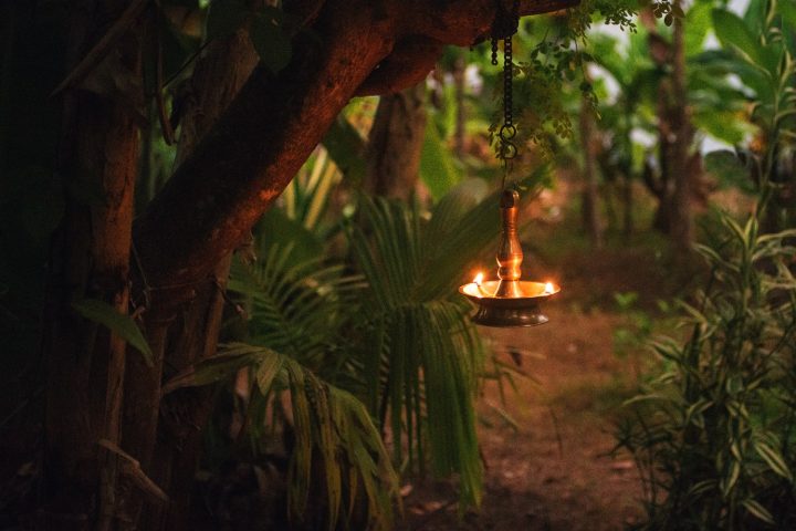 Yoga garden at night with oil lamp for relaxing atmosphere